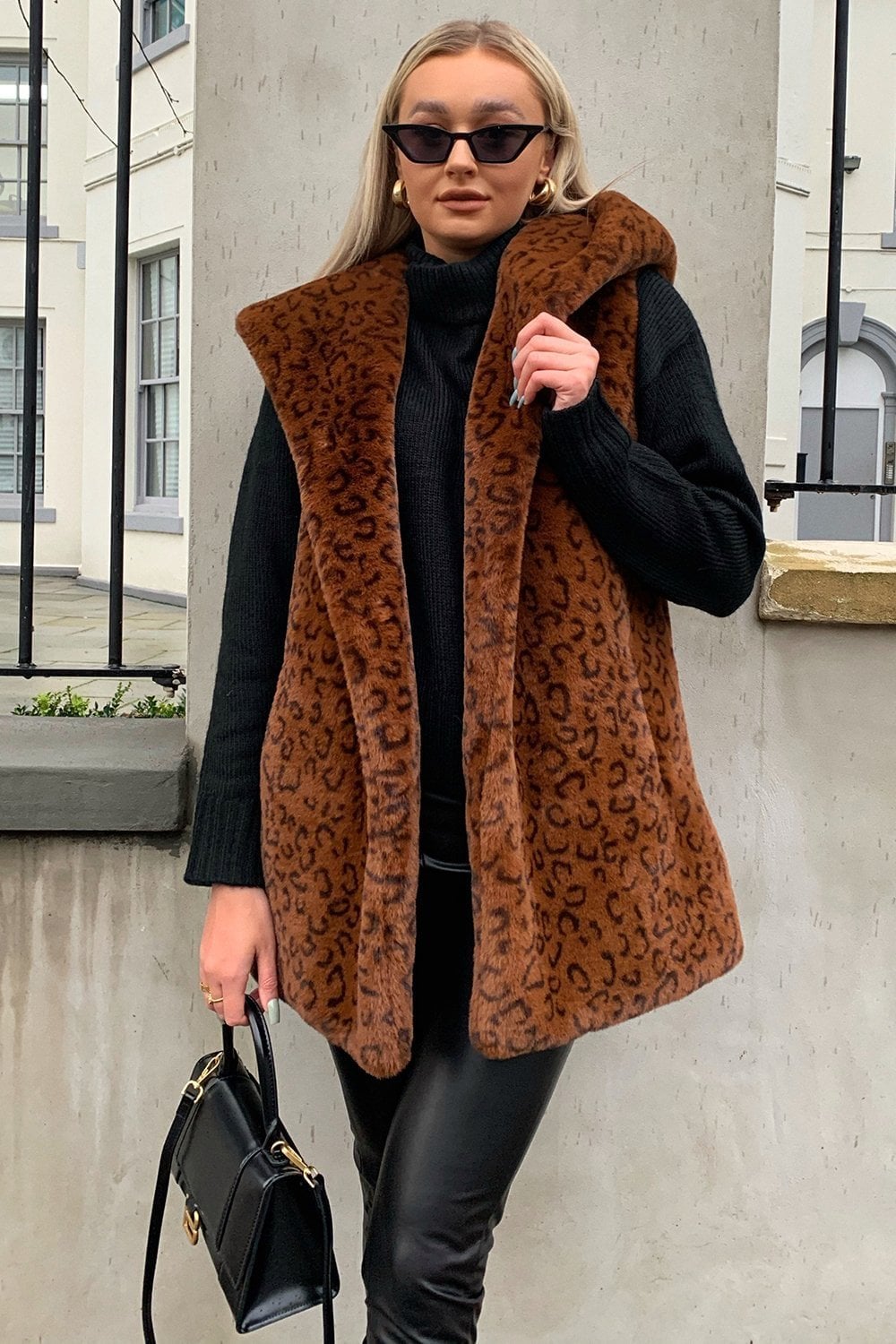 black fur hooded gilet